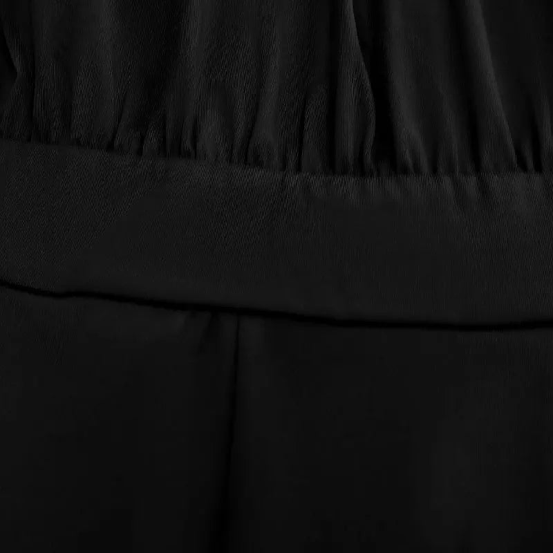 Elegant Black Sleeveless Jumpsuit – High Neck Wide Leg Evening Romper